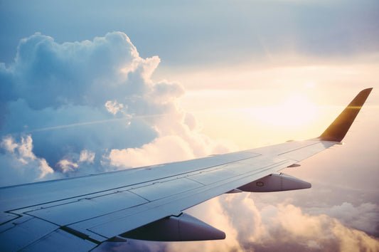 Poster: aerial photography of airliner – Ross Parmly (Unsplash)