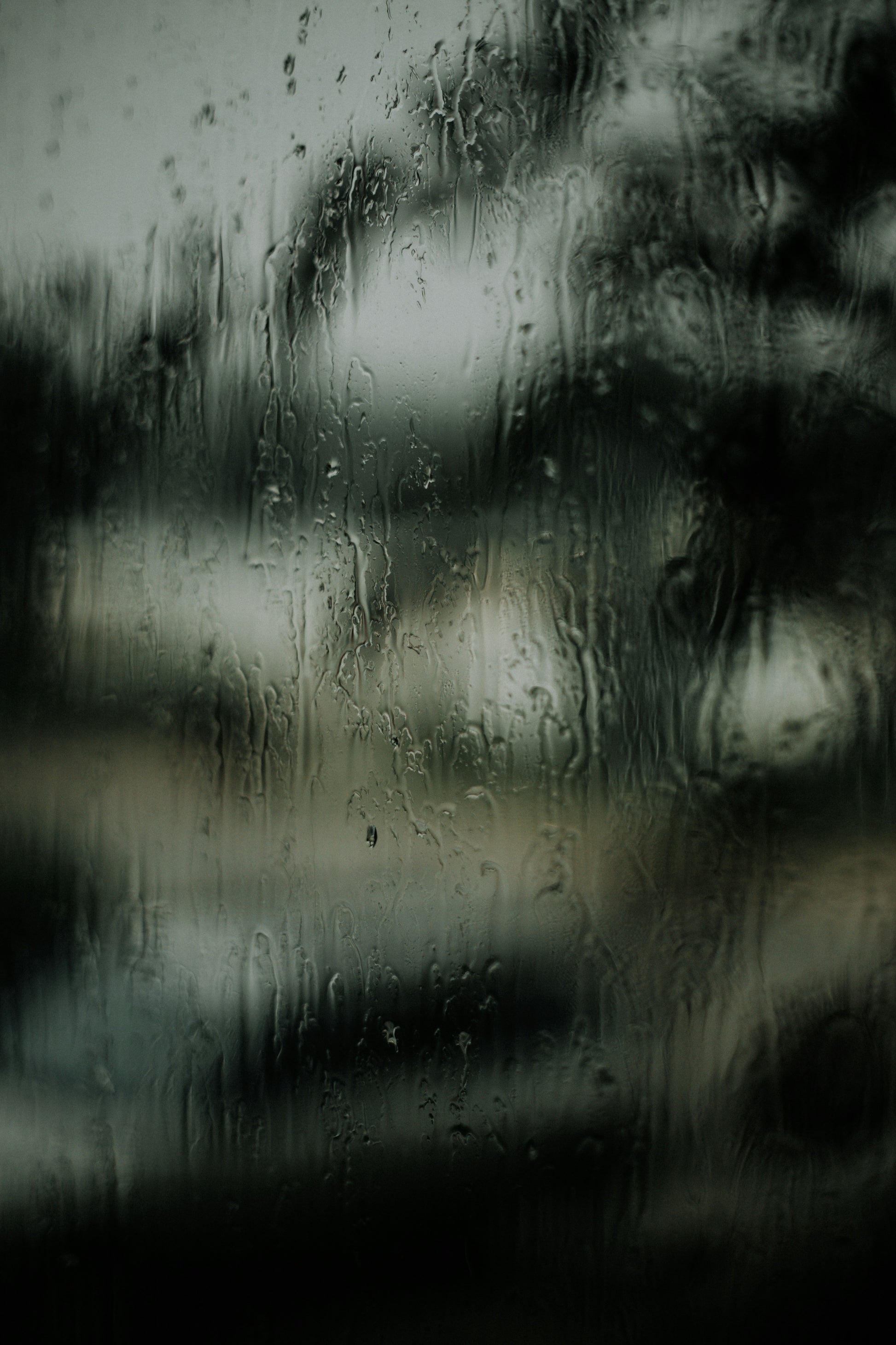 Stretched Canvas: macro photography of water droplets on clear glass – Priscilla Du Preez 🇨🇦 (Unsplash)
